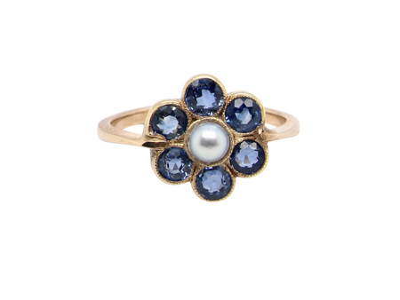 A vintage sapphire and pearl dress ring