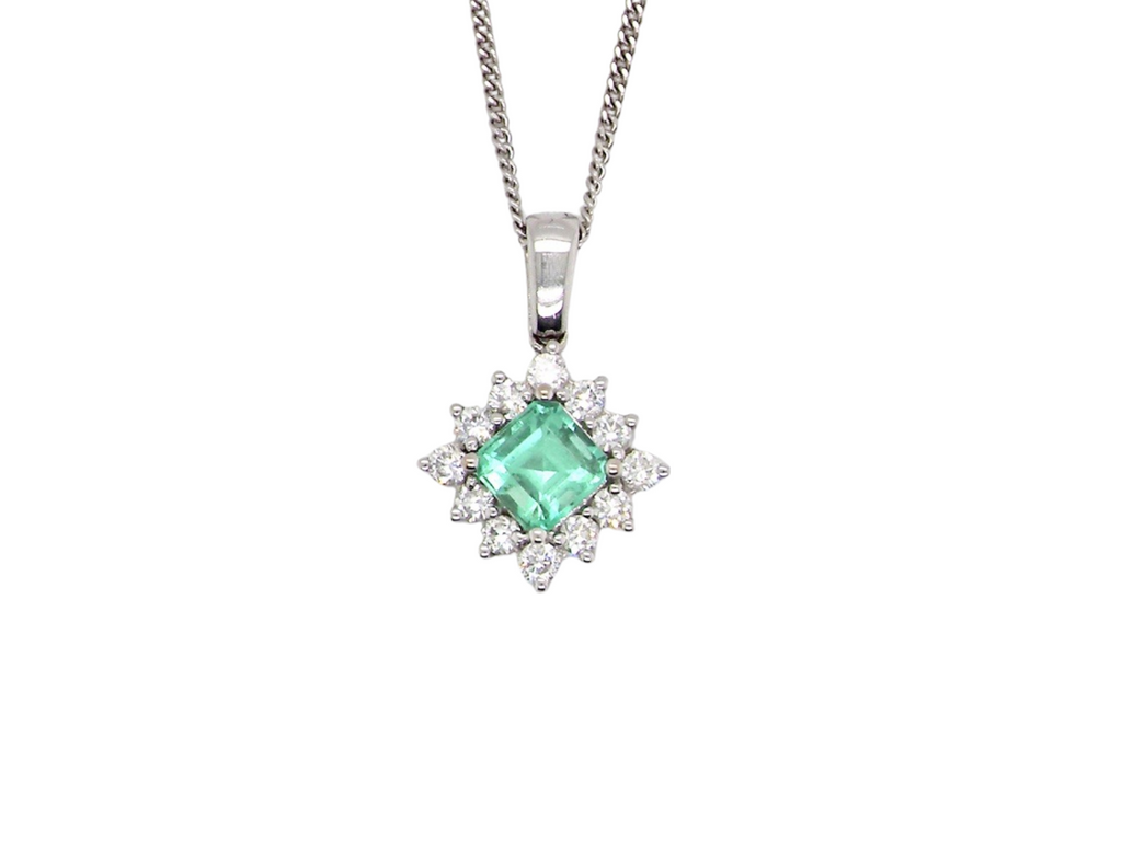A fine emerald and diamond pendant
