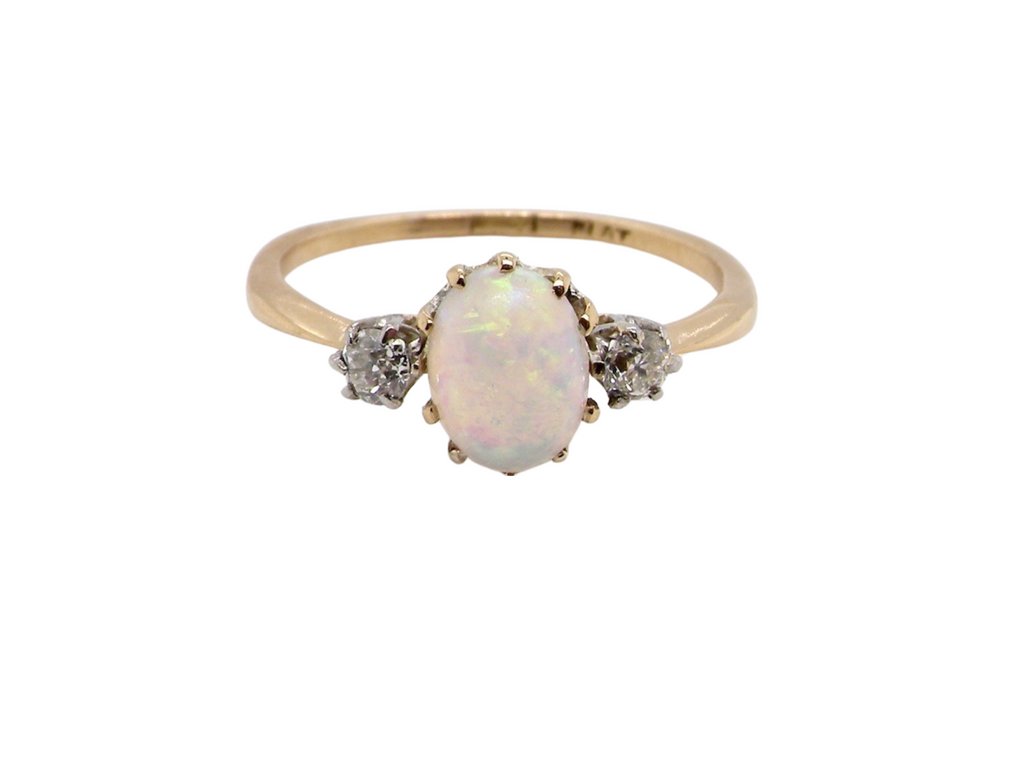 A vintage opal and diamond ring