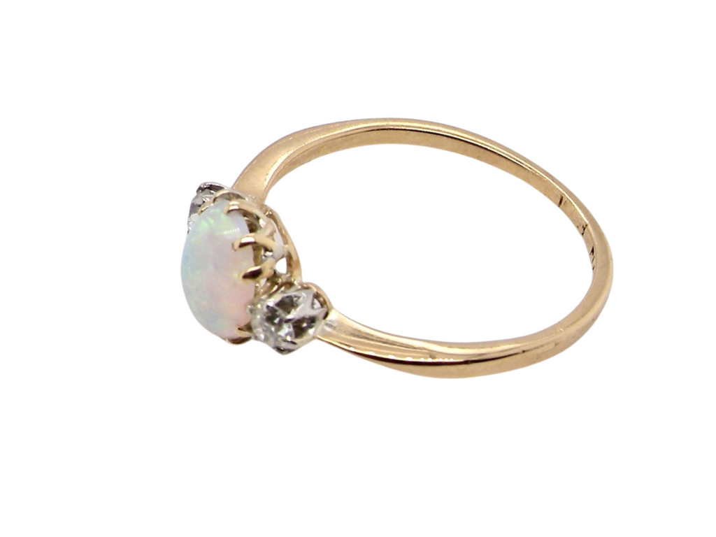 Side view of vintage opal and diamond ring