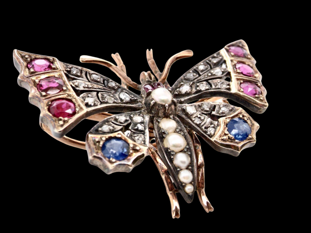 A Victorian gemstone butterfly brooch