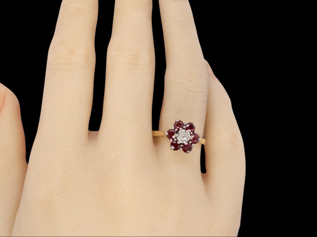 18 carat gold ruby and diamond cluster ring