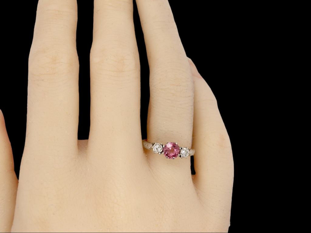 A pink tourmaline and diamond engagement ring