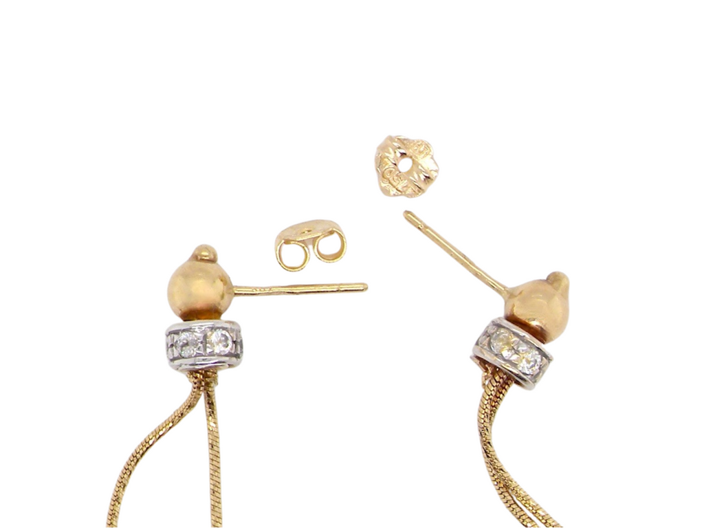 A pair of sapphire drop earrings