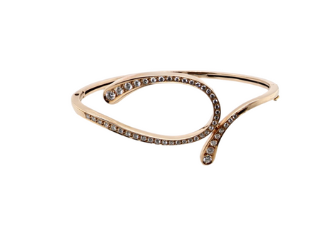A 14 carat gold diamond loop bangle