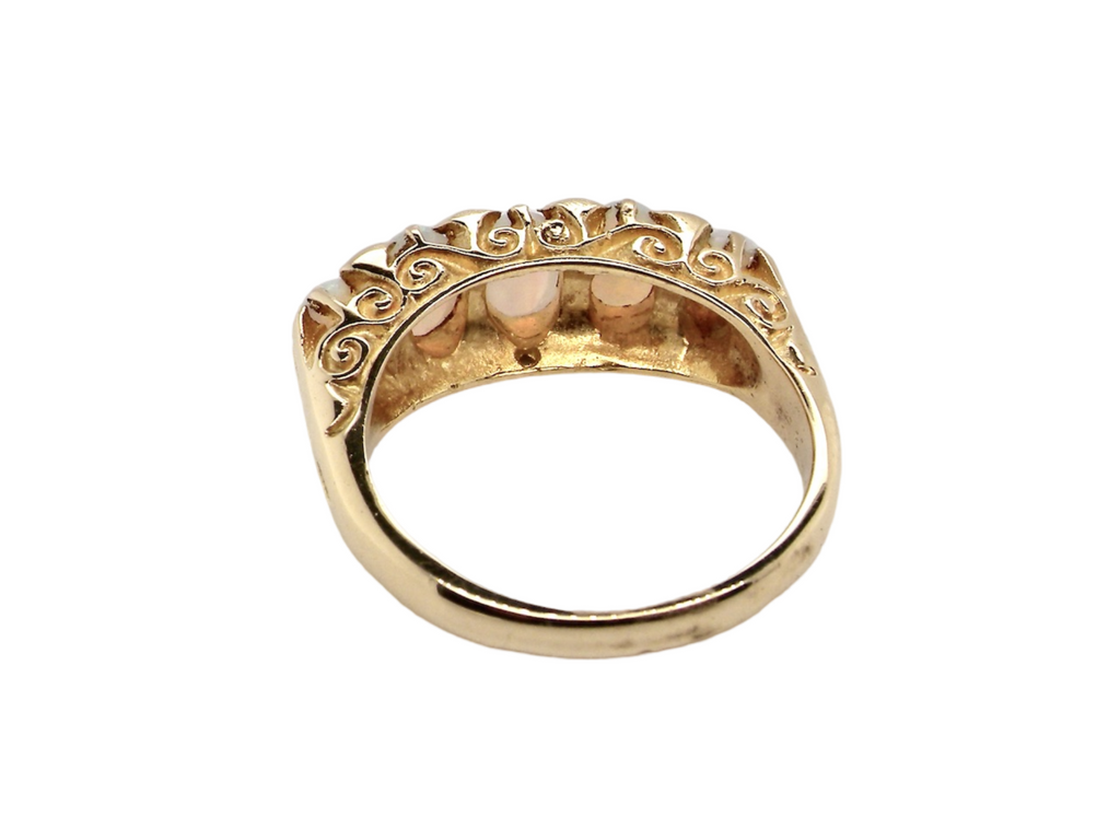 Reverse- 18 carat gold five stone opal ring