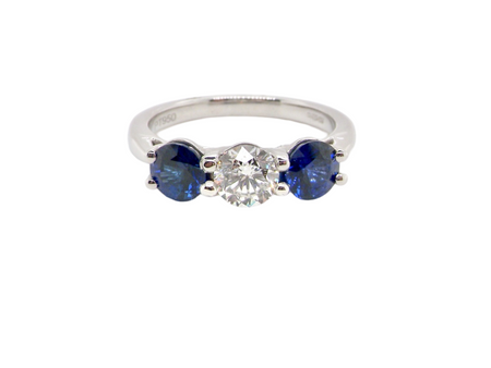 A fabulous sapphire and diamond three stone trilogy ring