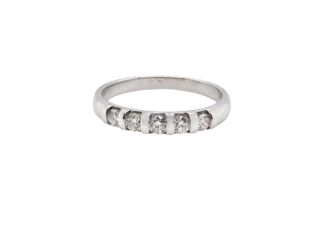 A half hoop diamond eternity ring