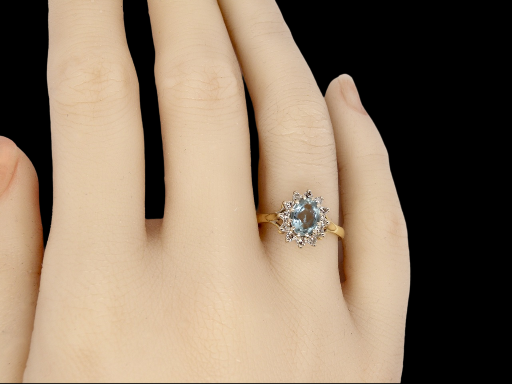 18 carat gold aquamarine and diamond cluster ring