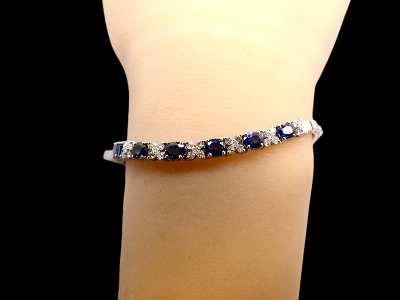 A modern white gold sapphire and diamond bracelet