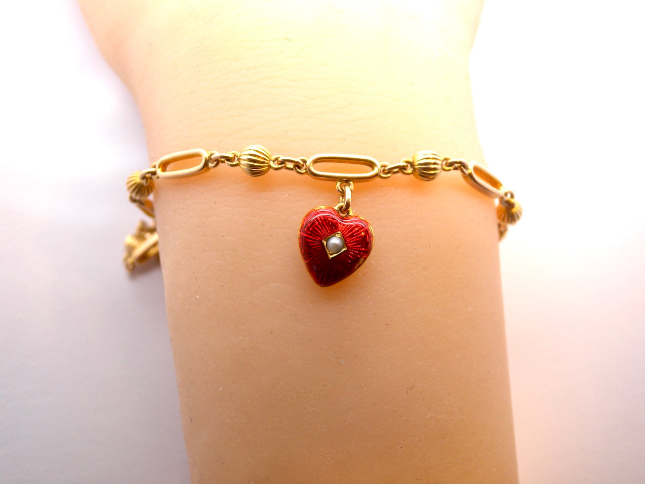 A Victorian bracelet with heart charm