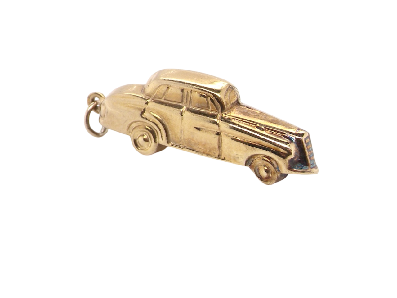 A vintage saloon car charm