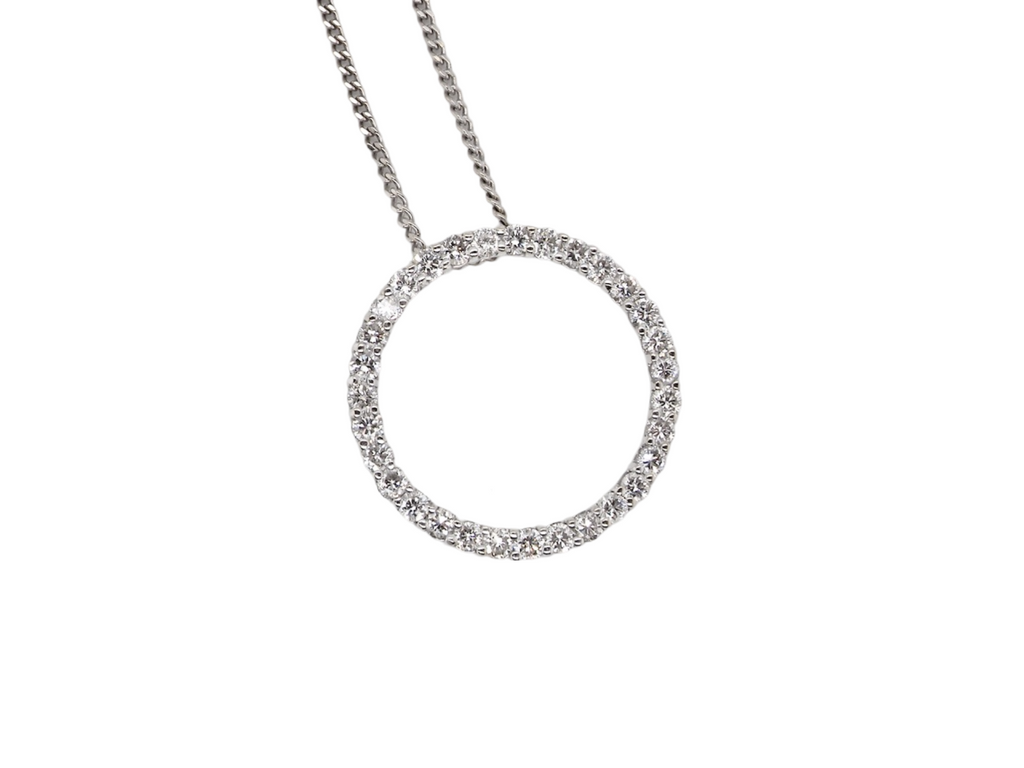 A white gold diamond circlet pendant