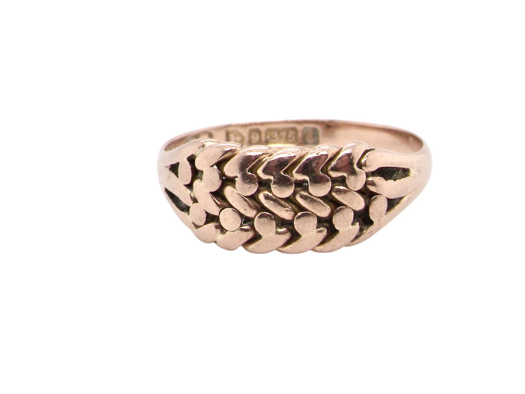 A rose gold keeper ring