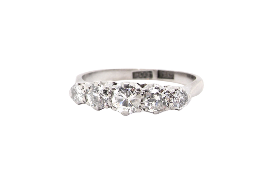 A vintage five stone diamond ring