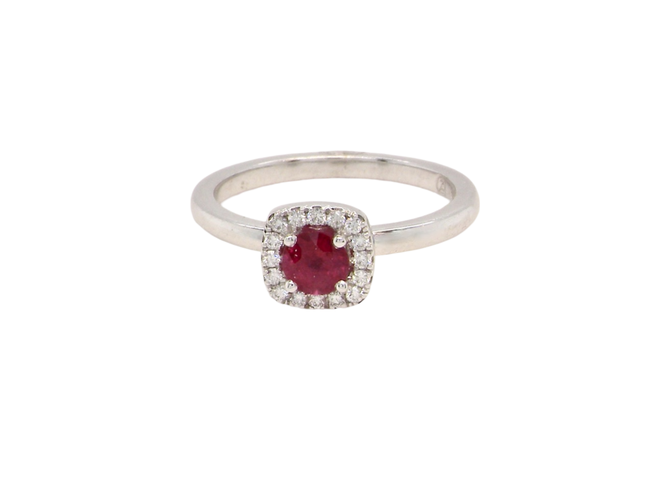 A cushion shaped ruby an d diamond cluster ring