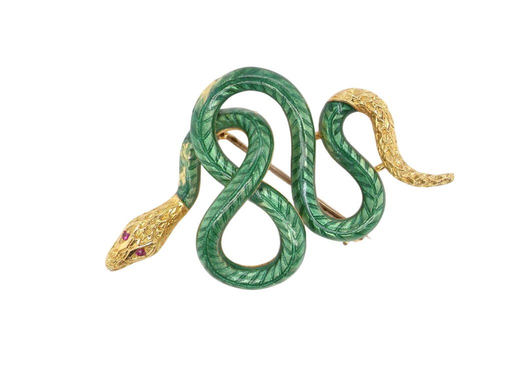 A fine enamelled snake brooch
