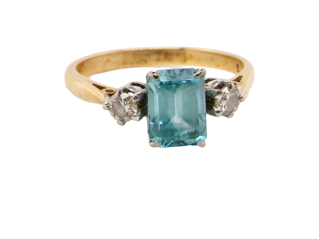 3 stone blue zircon and diamond ring