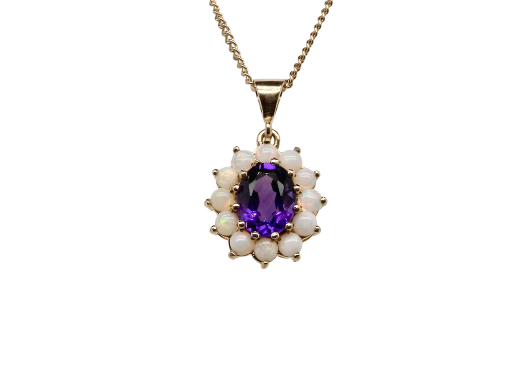 An amethyst and opal pendant