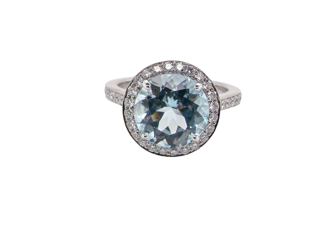 An Aquamarine and Diamond  Ring