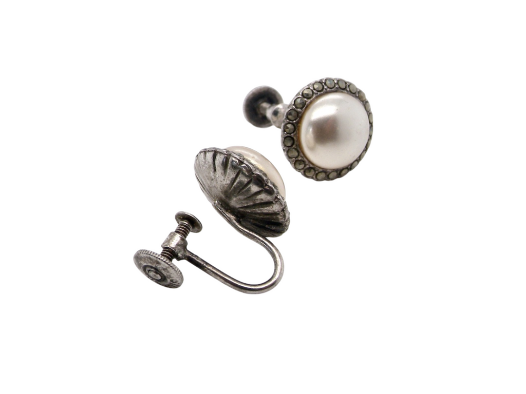 A vintage pair of pearl earrings screw fititngs