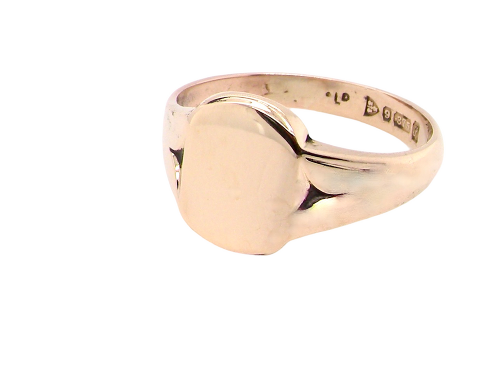 A man's gold signet ring