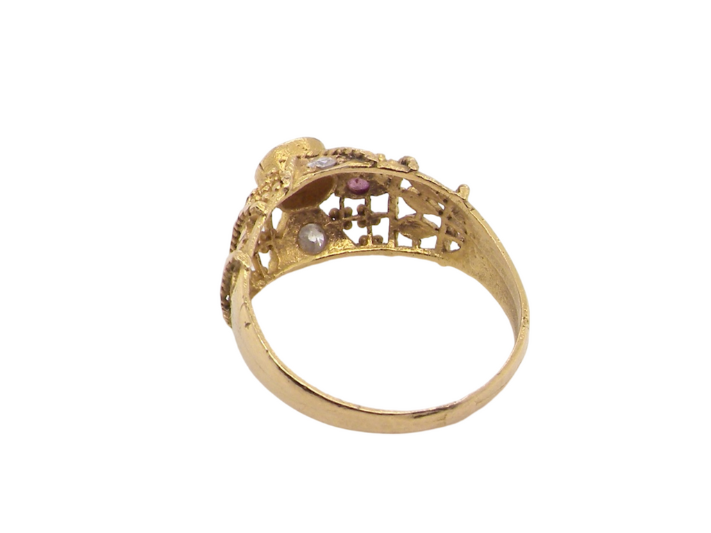 A high carat gold ruby and pearl dress ring rear view