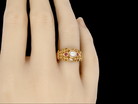  high carat gold ruby and pearl dress ring