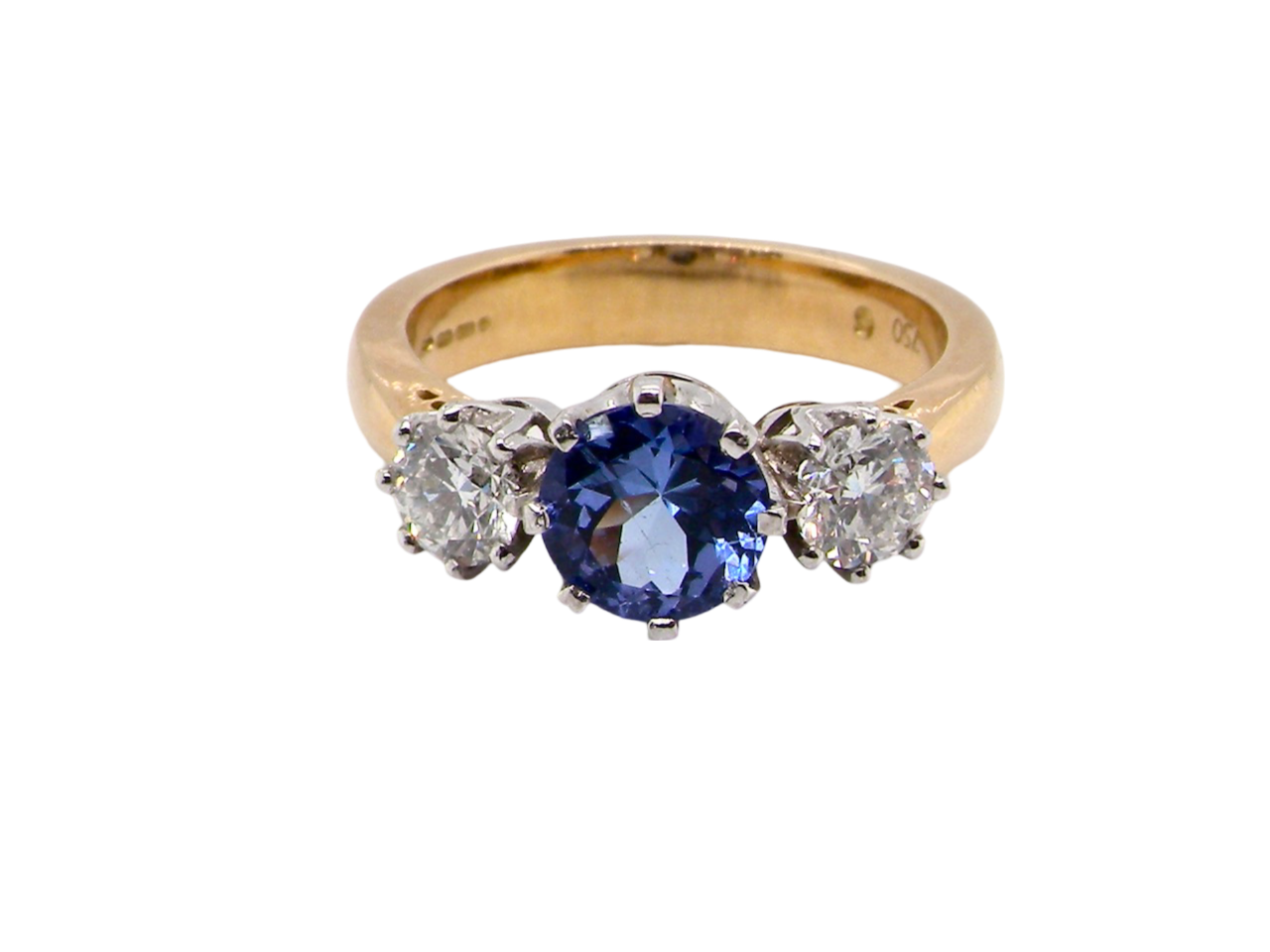 A three stone Tanzanite and Diamond Ring