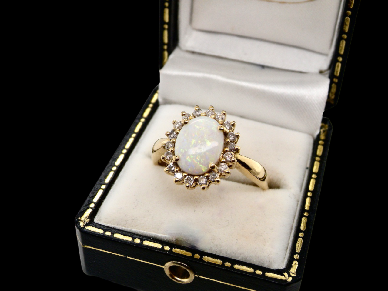 An opal and diamond  ring