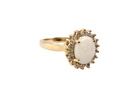 An opal and diamond cluster ring