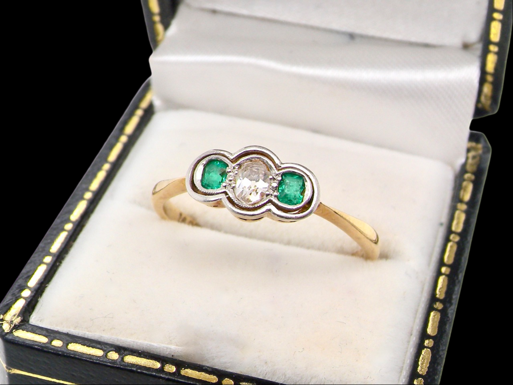 A  emerald and diamond ring