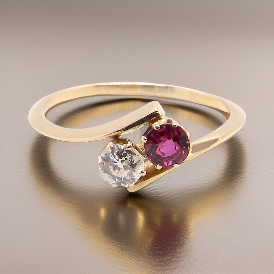 A 2 stone Ruby and Diamond ring