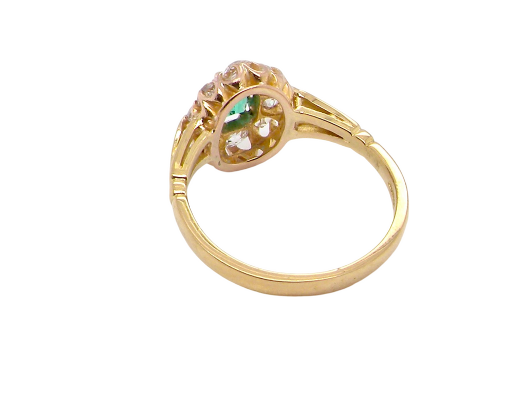 An Emerald and Diamond Cluster Ring rear view