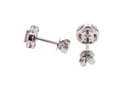 A pair of pink sapphire and diamond earrings rear view