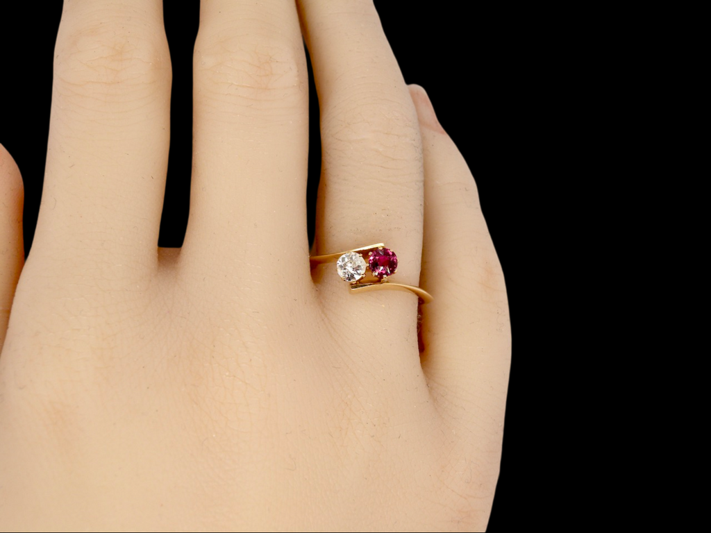 A two stone Ruby and Diamond ring finger view
