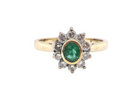 An Emerald and Diamond  Ring