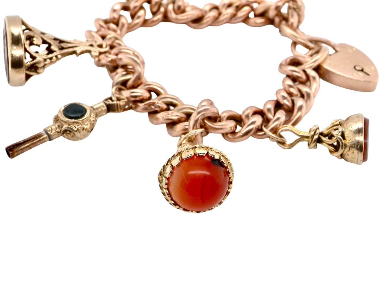 A gold charm bracelet with seals