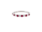 A white gold ruby and diamond eternity ring