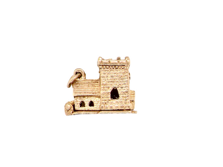 A 9 carat gold church charm