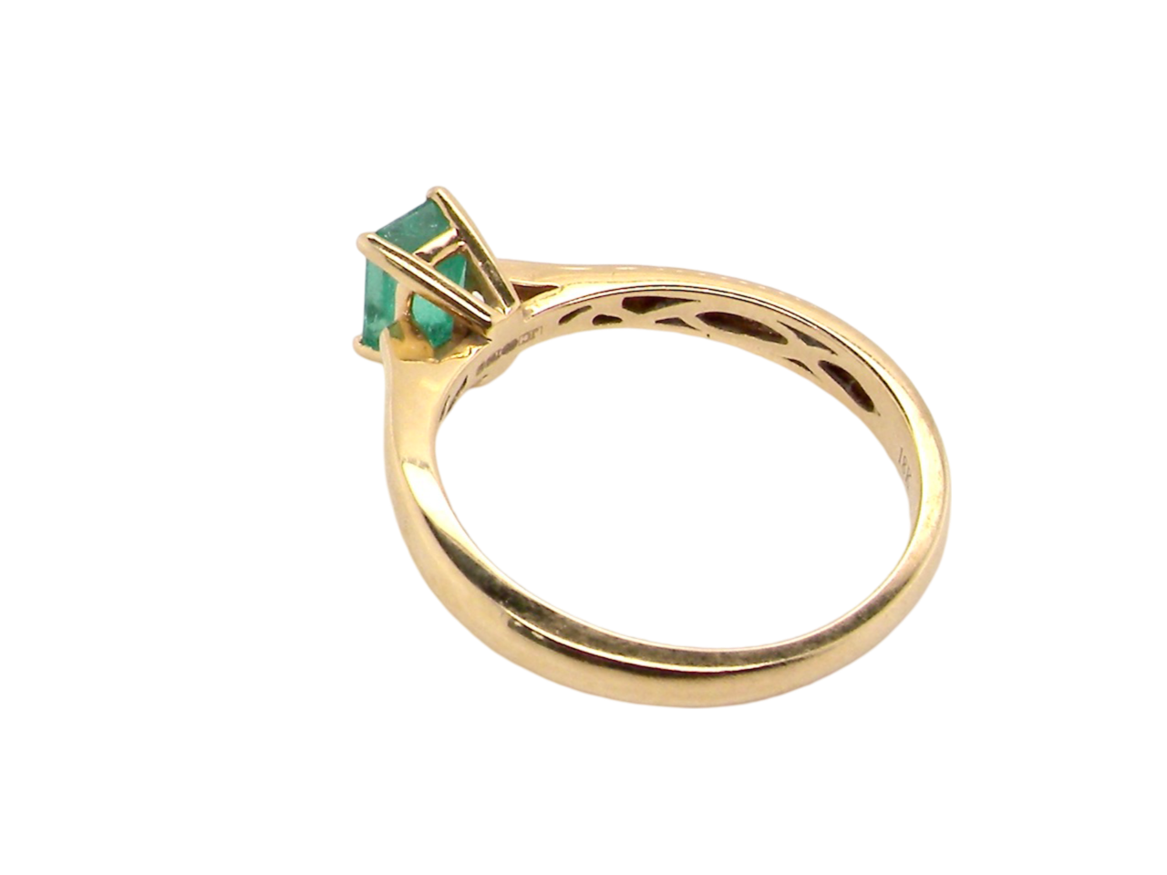 A solitaire Emerald Ring rear view