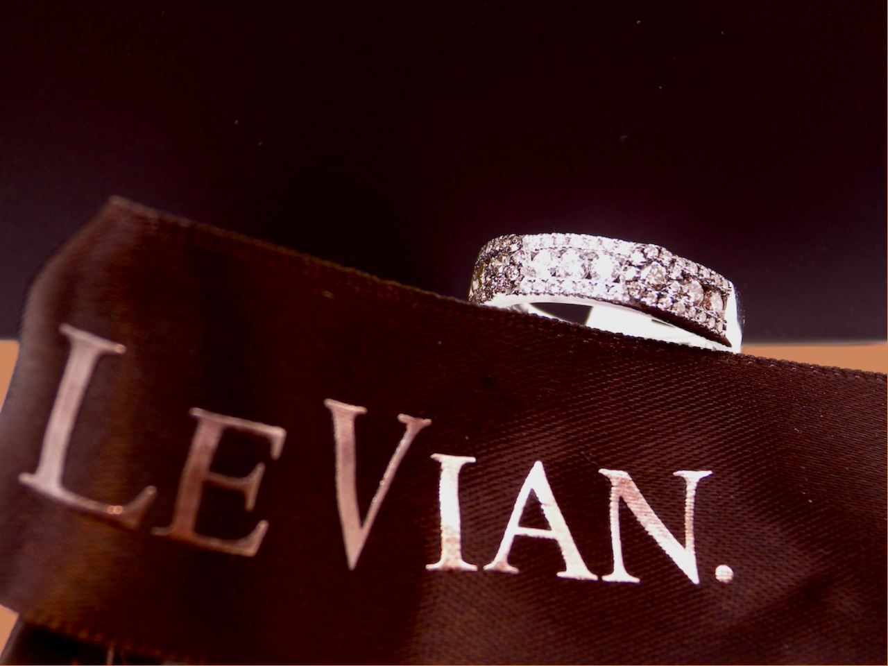 A Le Vian Diamond Half Hoop Ring with ribbons