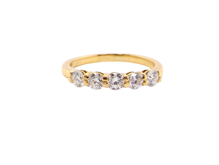 A five stone diamond half hoop ring