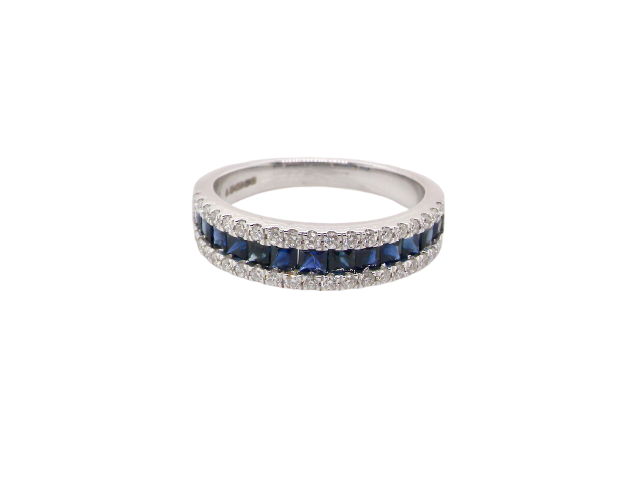 A white gold sapphire and diamond eternity ring