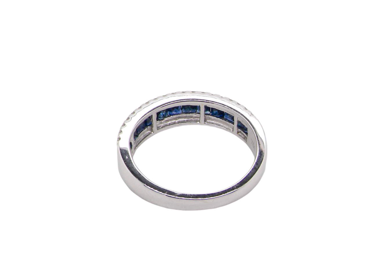 A white gold sapphire and diamond eternity ring rear view