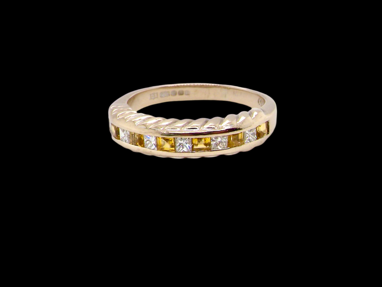 yellow sapphire and diamond eternity ring