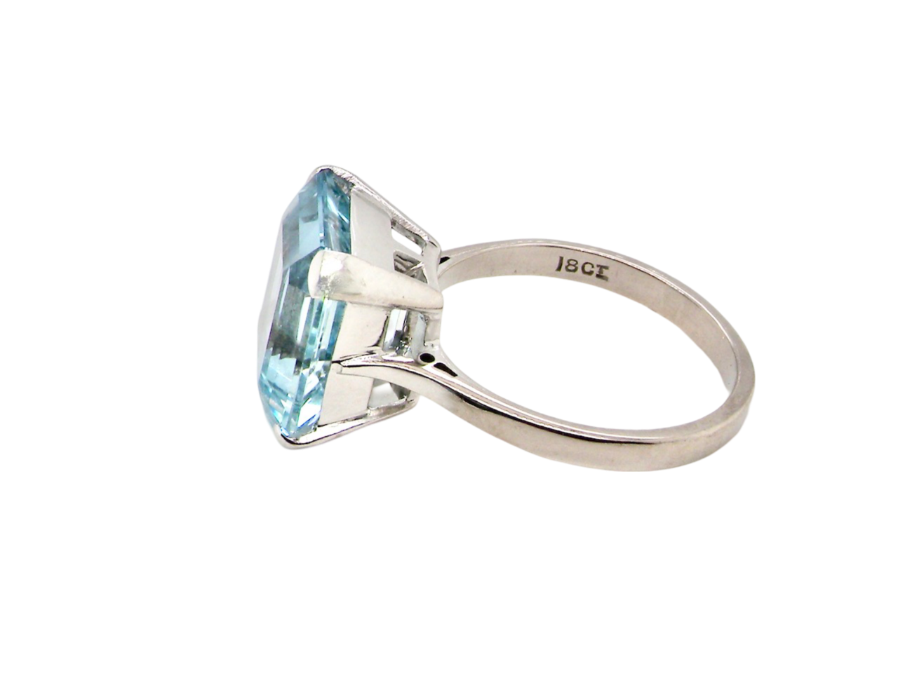 An aquamarine dress ring side view