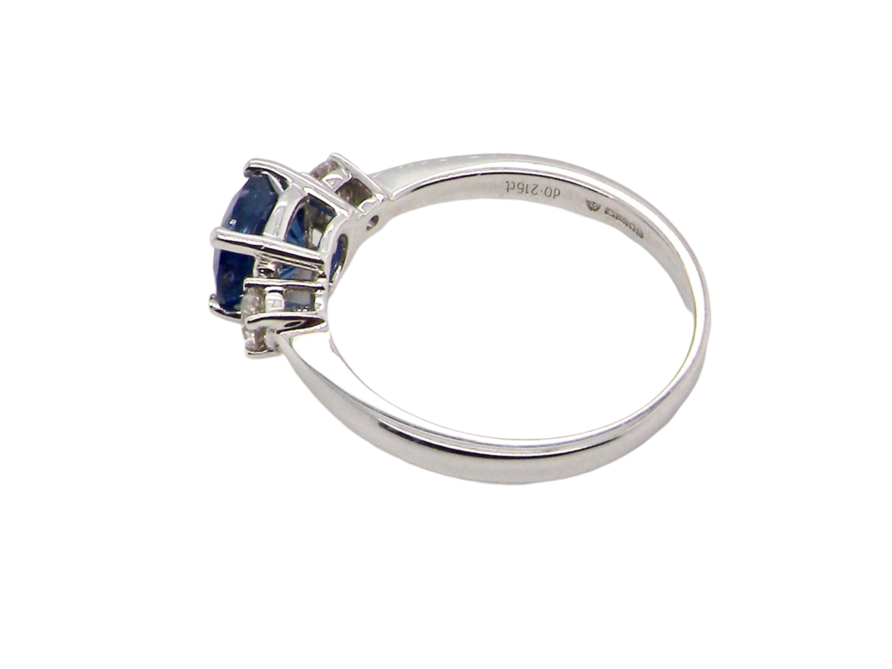 A fine three stone Sapphire and Diamond Ring side view