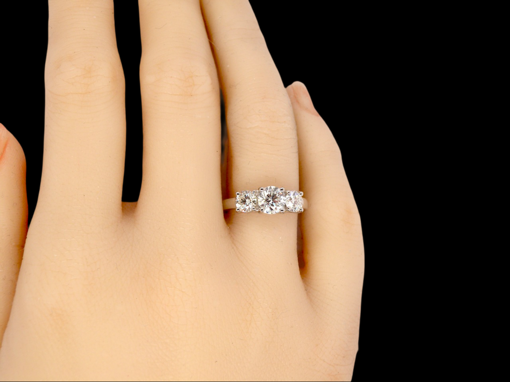 A fine and impressive trilogy Diamond Ring finger view