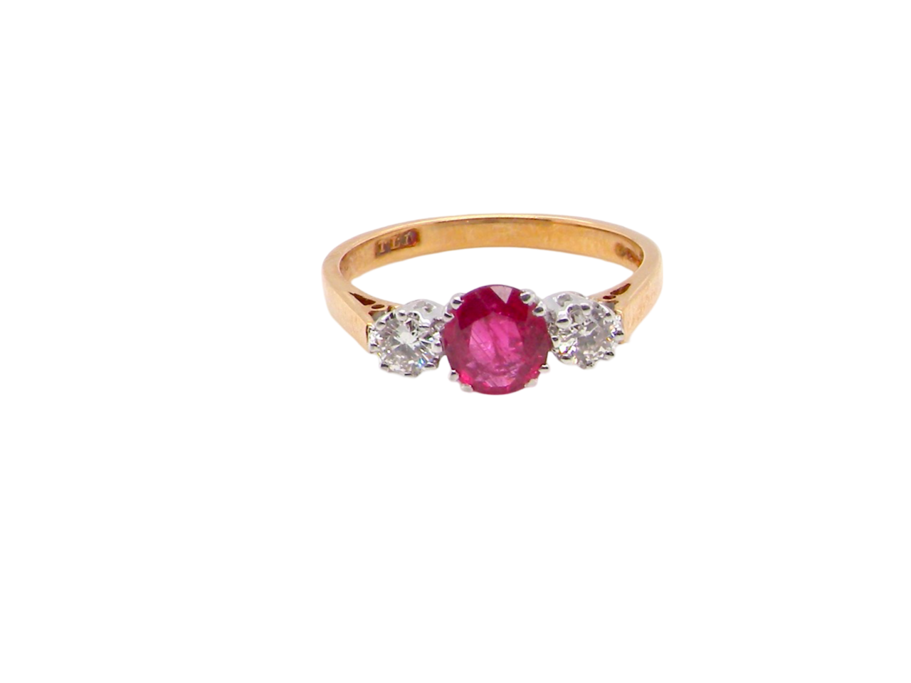 A Three Stone Ruby and Diamond Ring